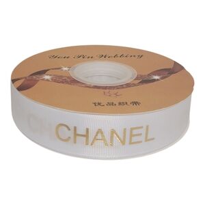 CHANEL White Ribbon with Gold Lettering